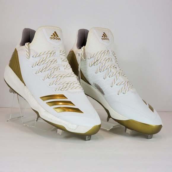 baseball cleats white and gold